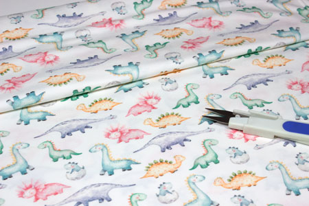 Tela para coser camiseta con dibujos de dinosaurios