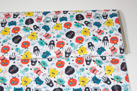 Detalle tela algodon funny monsters