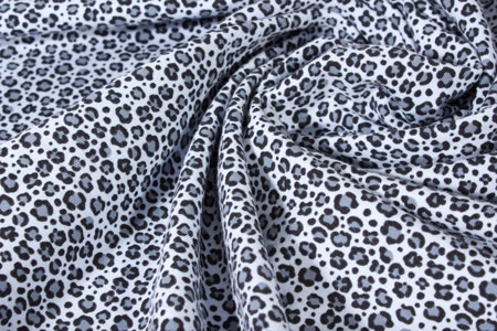 Tela de punto de camiseta animal print