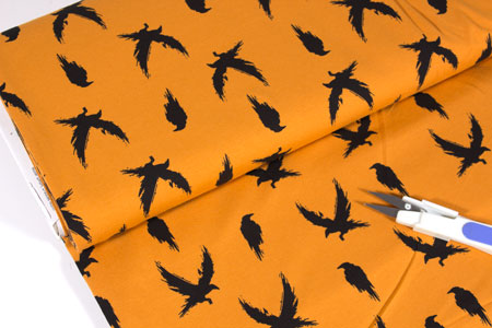 Tela jersey cuervos ocre
