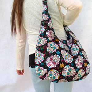 Bolsa bandolera tela folk skull