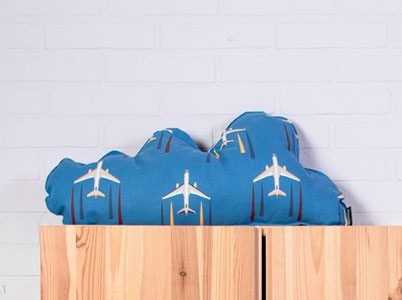 Cojin con tela de aviones